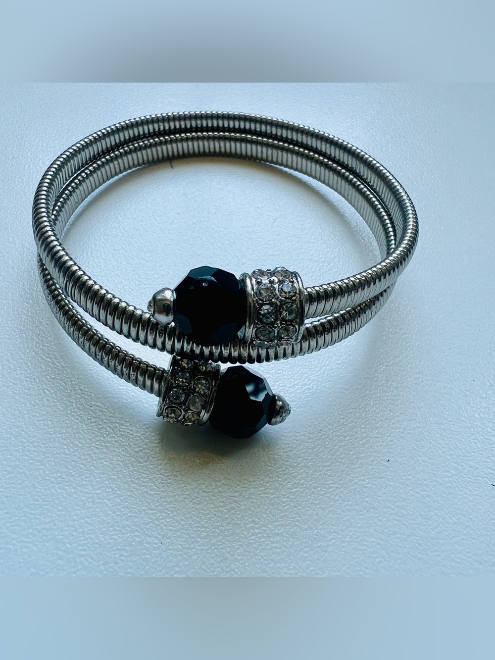 Silver Coil Wrap Bracelet with Black Crystal Accents
